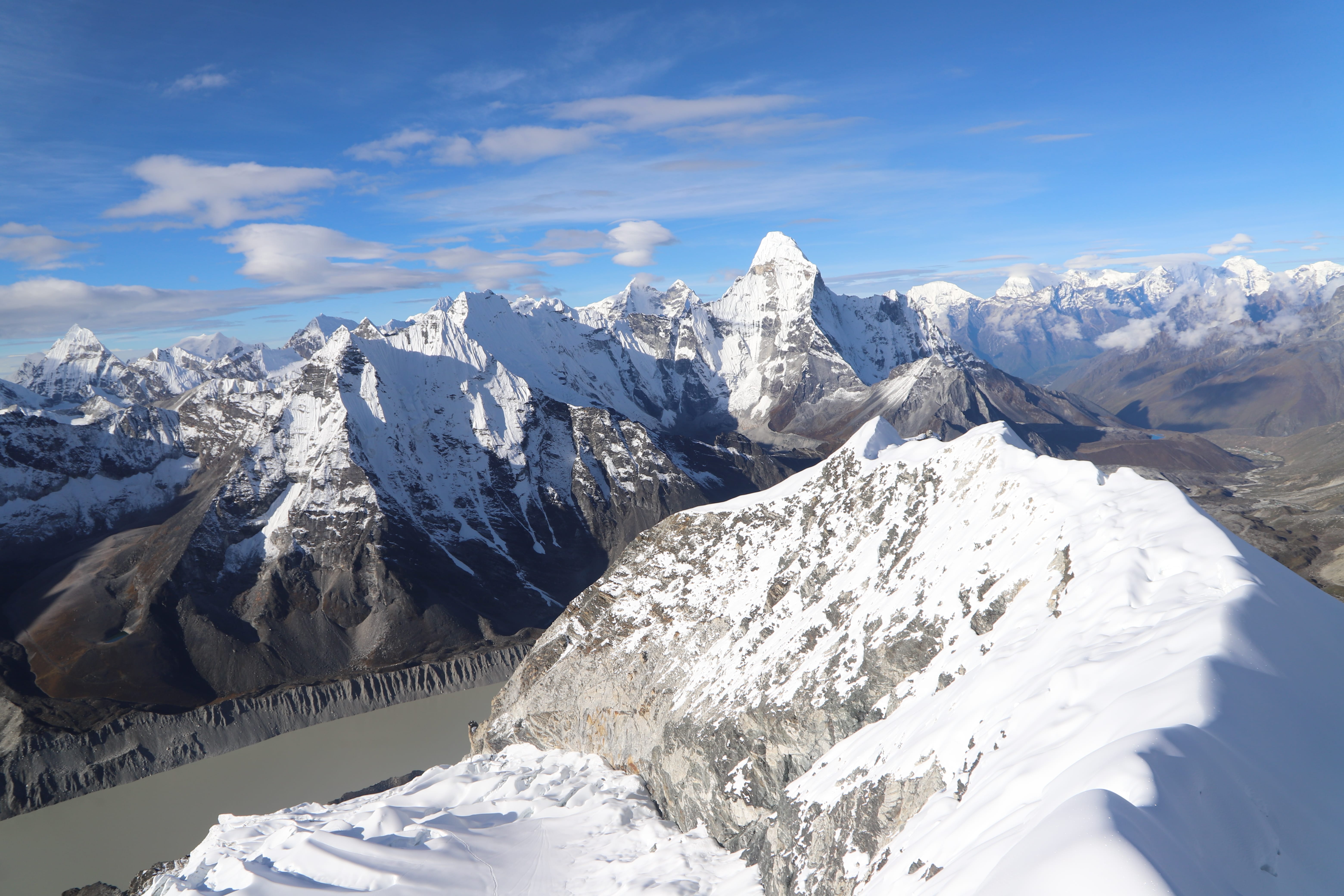 Ascend from Base Camp to High Camp (5600m) to Summit (6189 m) then descend to Island Peak Base Camp and finally to Chhukung (4750m)